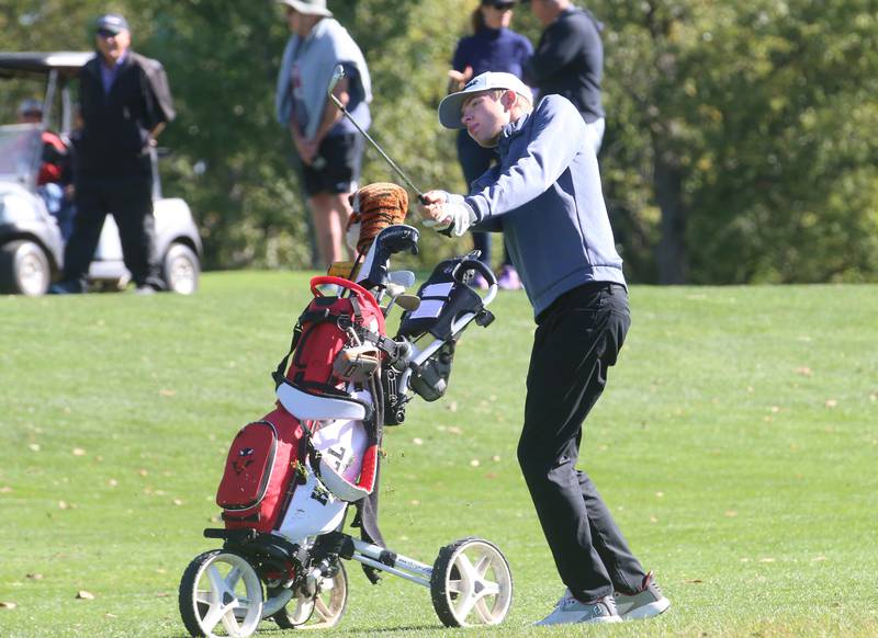 Hall's Landen Plym drives the ball toward the 8th hole during the Class 1A golf meet on Wednesday, Oct. 2, 2024 at Spring Creek Golf Course in Spring Valley.