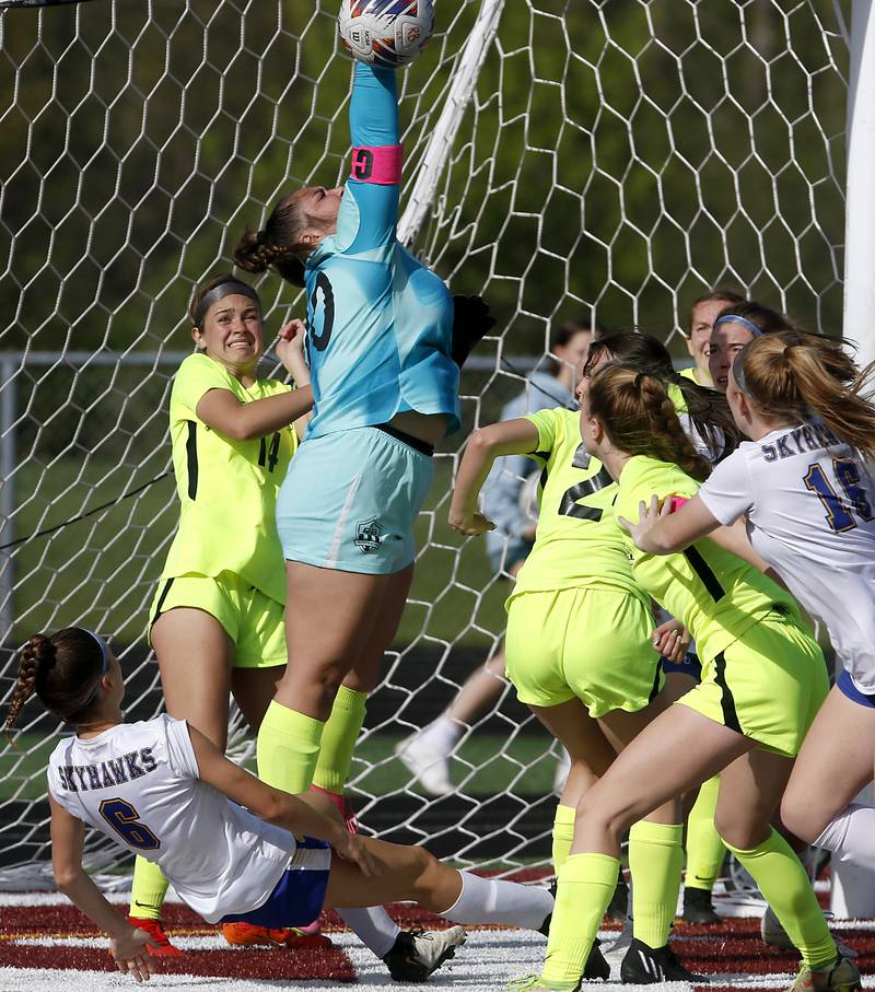 Richmond-Burton goalie Taylor Labay knocks the ball away during a Johnsburg corner kick during the Kishwaukee River Conference Girls Soccer Tournament Championship Match on Wednesday, May 1, 2024, at Richmond-Burton High School.