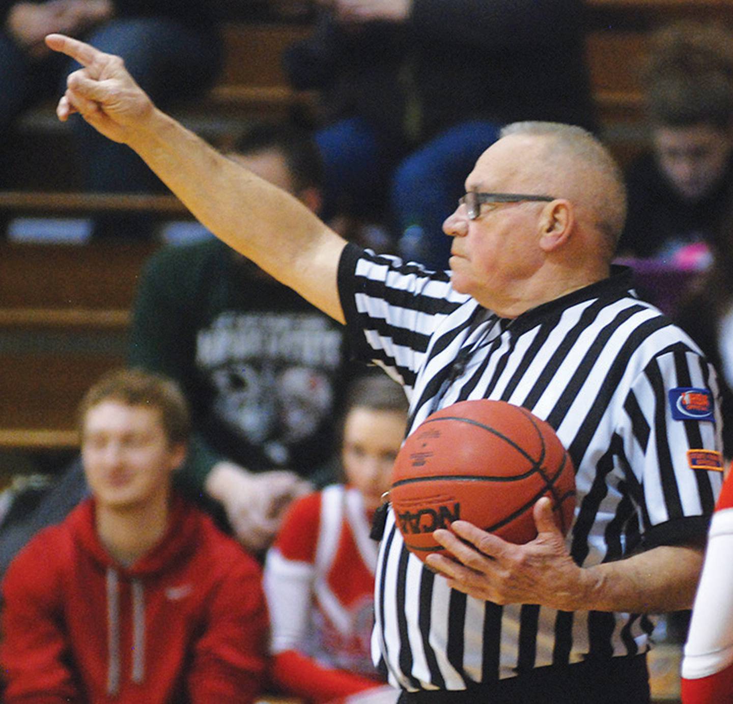 Don Cook signals during a Big Northern Conference basketball game in 2015. Cook retired as a basketball official after the 2015 season, but is still in charge of assigning officials to games for the Big Northern Conference – a job that has been made much harder by the COVID-19 pandemic.