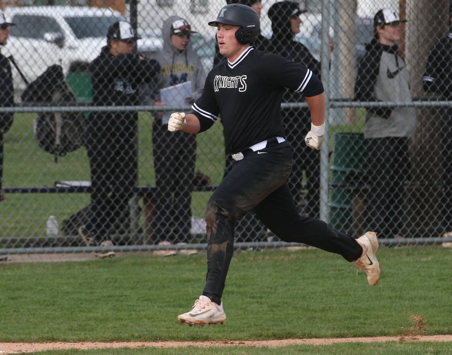 Kaneland's Collin Miller runs to home to score the teams first run against L-P on Wednesday, April 5, 2023 at Dickinson Field in Oglesby.