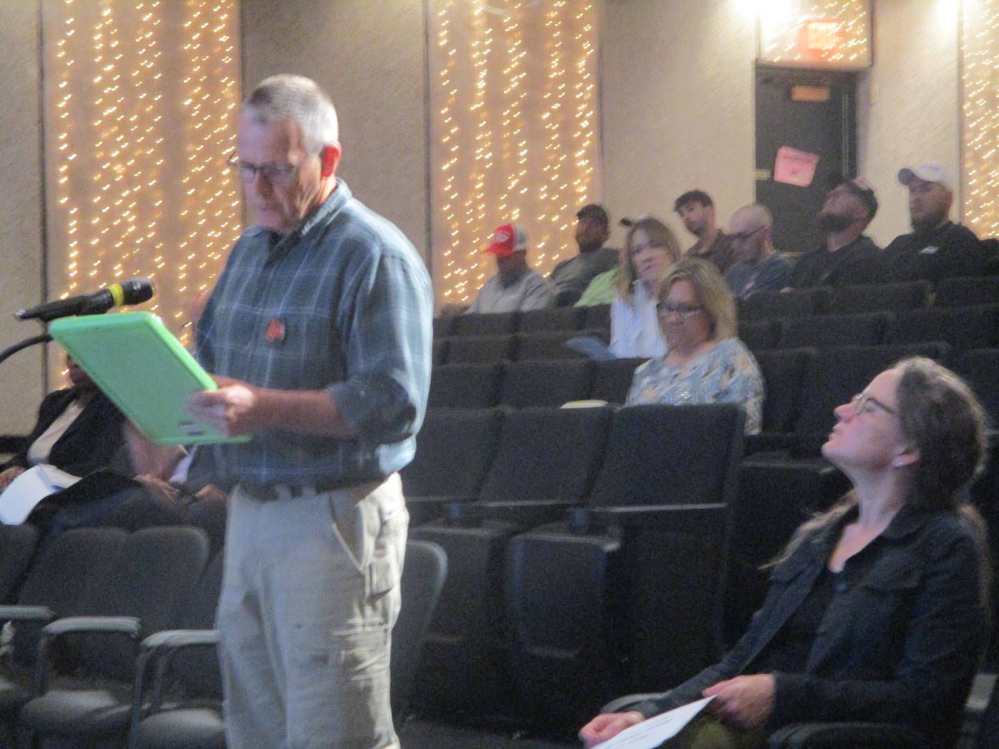 Morris resident Mike Gallagher speaks against the proposed $316 million rate increase for Nicor Gas at a public hearing Monday in Joliet. June 9, 2025