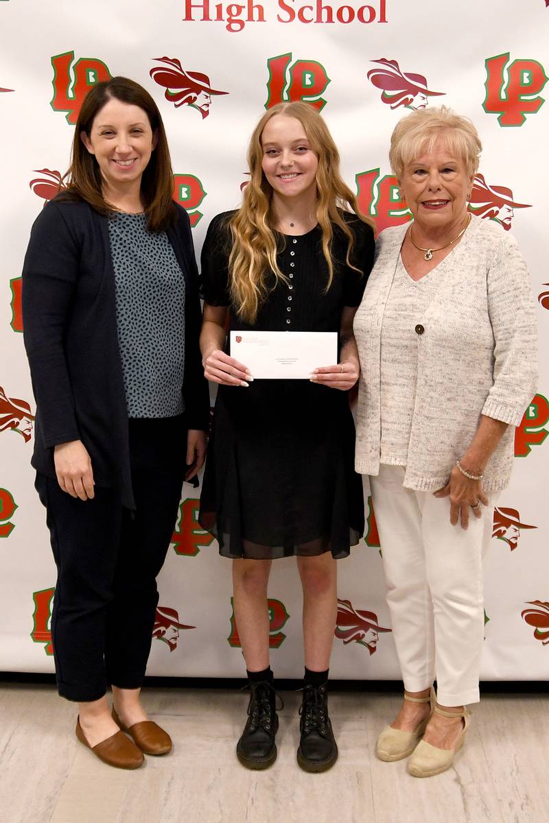 Aidan Harmon (middle) received the L-P Foundation for Educational Enrichment Scholarship. This $1,000 scholarship is awarded to a graduating L-P senior with a minimum cumulative GPA of 3.0, acceptance to two- or four- year college or trade school and a combination of classroom excellence and extra-curricular activities including 100 hours of community service.