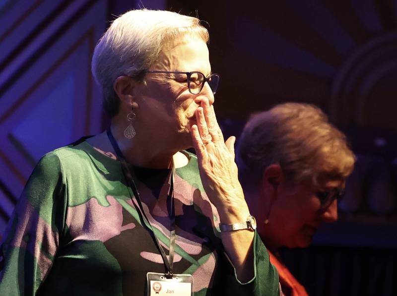 Jan VanderMeer, retired from Northern Illinois University, blows a kiss as she is announced as this year’s Woman of Accomplishment Honoree Thursday, Oct. 10, 2024, during the Athena and Women of Accomplishment Awards reception hosted by the DeKalb Chamber of Commerce at the Egyptian Theatre.