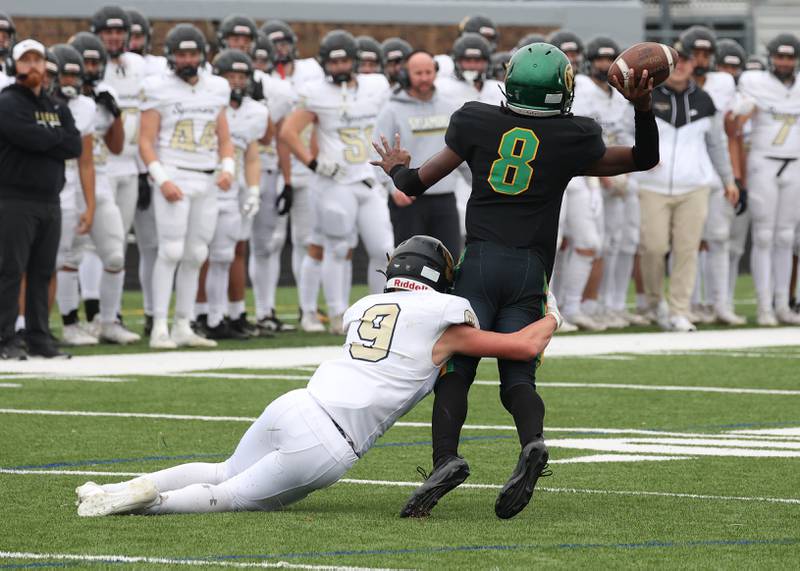 Sycamore's Caden O’Donnell hits the Westinghouse quarterback Dylan Mosley Saturday, Nov. 9, 2024 during their Class 5A second-round playoff game at Knute Rockne Stadium in Chicago.