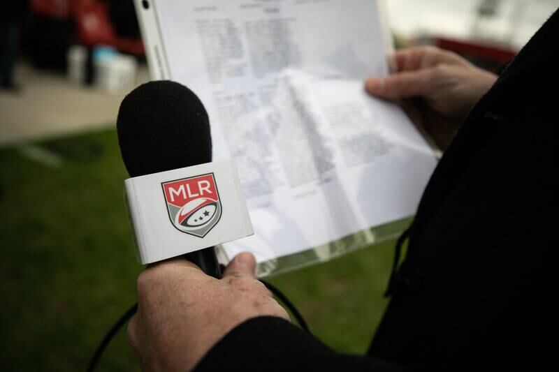 Major League Rugby’s sideline reporter Rob Hammerschmidt, goes over some pre-match notes before the start of the NOLA Gold versus the Chicago Hounds rugby game at Seat Geek Stadium in Bridgeview, on Sunday April 23, 2023.