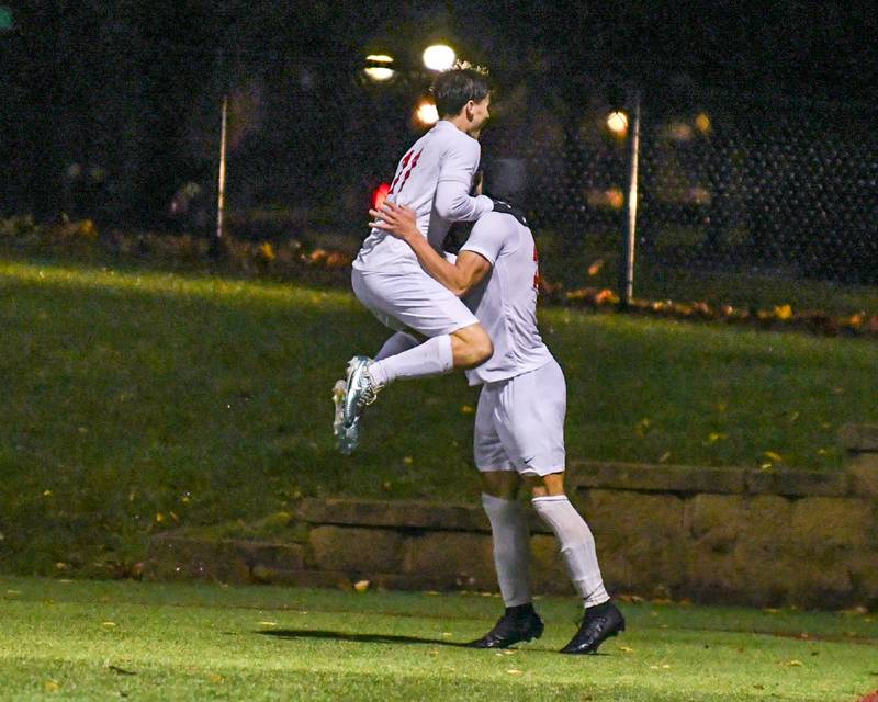 Benet Academy's Sean Boyle, left, celebrates with teammate William Khazen after William scores a goal during the class 2A super sectional soccer match on Tuesday Nov. 5, 2024, held at Wheaton Academy in West Chicago while taking on Prairie Ridge.