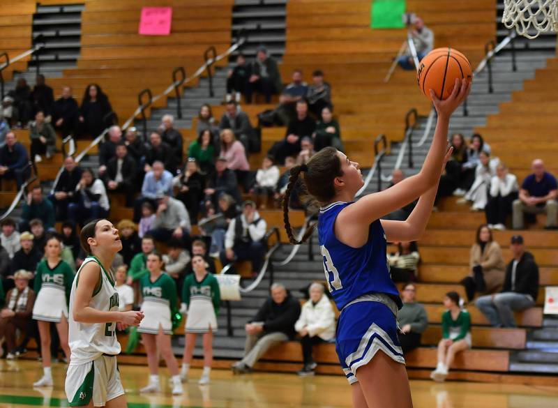 Lyons Township’s Emma O’Brien puts up an uncontested layup to cross the 1000 point mark during a game against York on February 4, 2025 at York High School in Elmhurst.