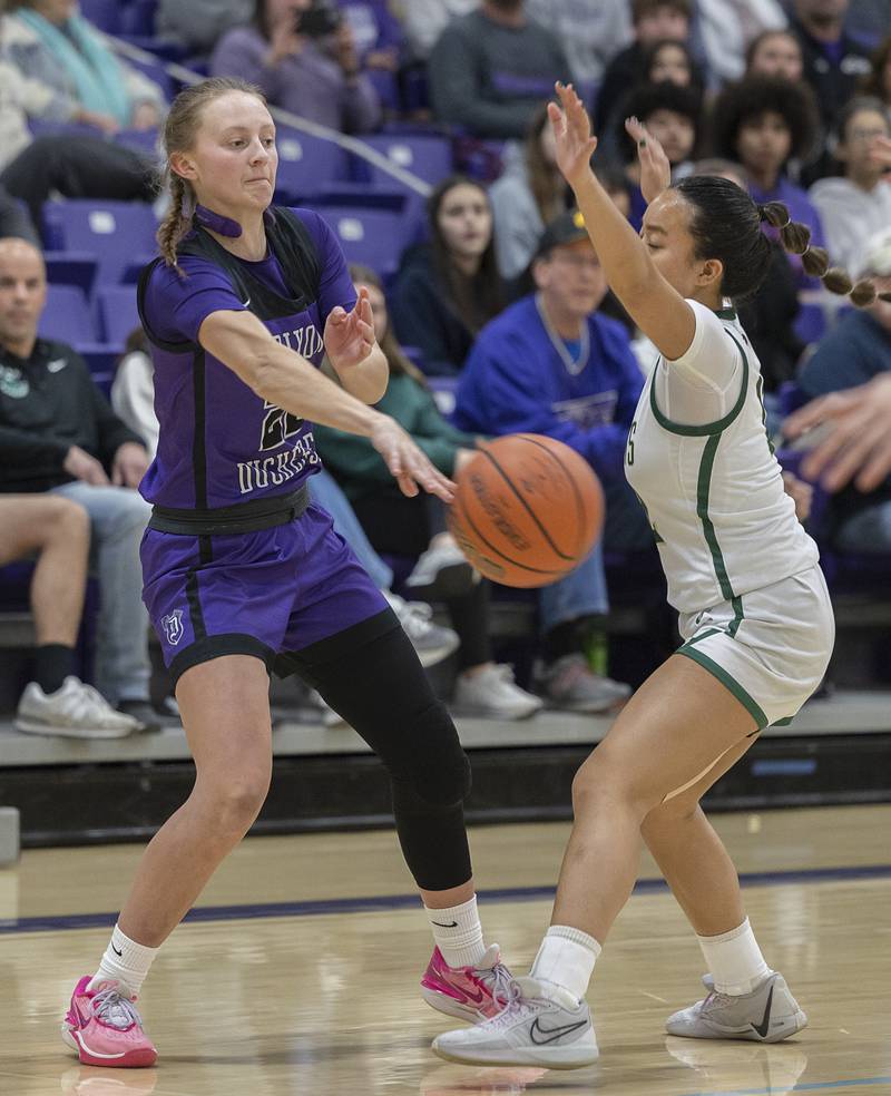 Dixon’s Katie Drew makes a pass against Boylan Friday, Feb. 16, 2024 at the class 3A Rochelle girls basketball regional.
