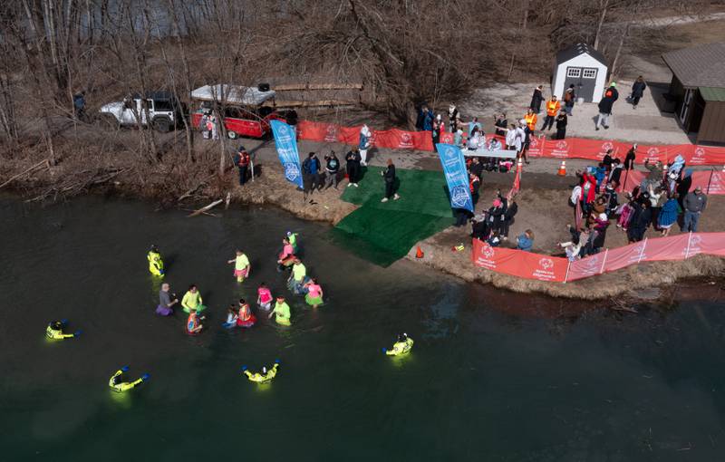 Members of the Kendall County Sheriffs Department participate in the Law Enforcement Torch Run Polar Plunge for Special Olympics Illinois Athletes at Silver Springs State Park on Sunday, Mar 1, 2026 in Yorkville.