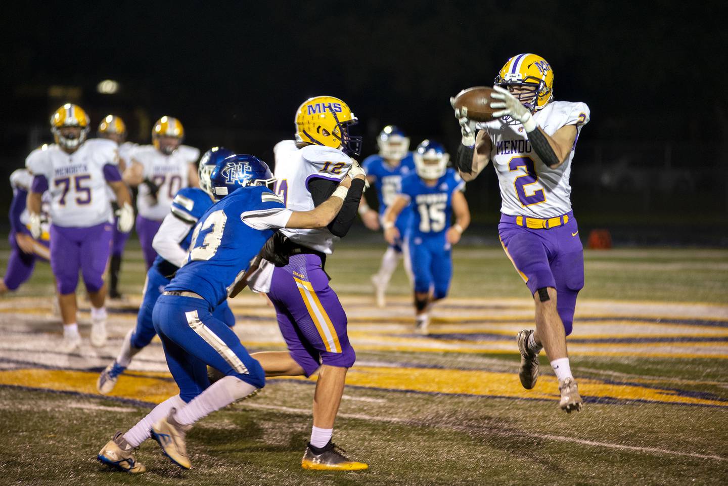 Mendota’s #2 (roster unidentified) takes the hook and ladder toss from Braiden Freeman for a touchhdown Friday, Oct. 14, 2022 against Newman.