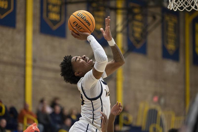 Sterling’s Kaedon Phillips goes strong to the hoop against St. Viator Monday, Jan. 20, 2025, during Sterling’s MLK Classic.
