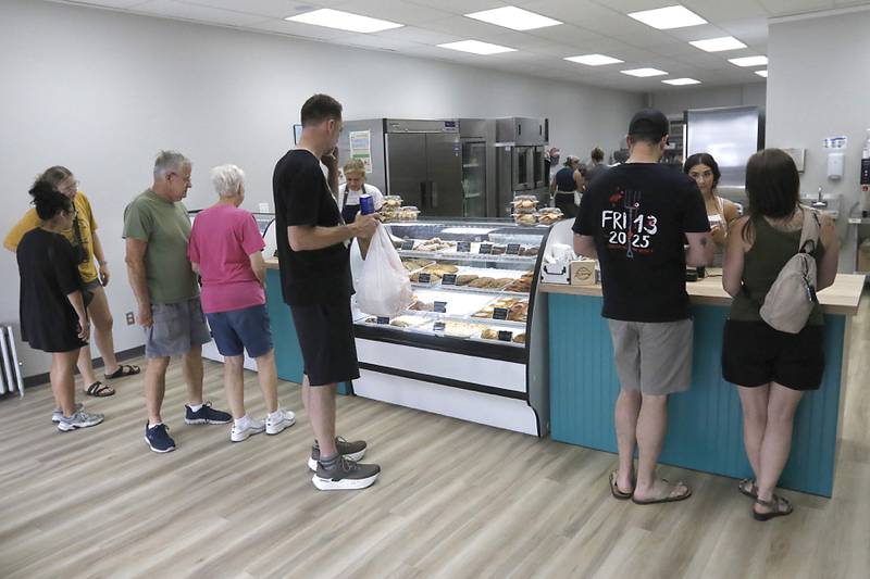 People shop for backed goods on Friday, June 27, 2025, at the recently opened Black Market Bakery in downtown Crystal Lake.