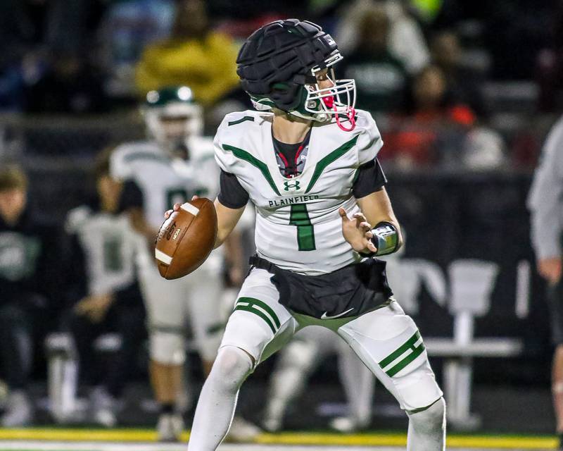 Plainfield Central's Tommy Morrisette drops back to pass during a football game between Plainfield Central at Joliet West on Friday, Oct 25th, 2024  in Joliet.