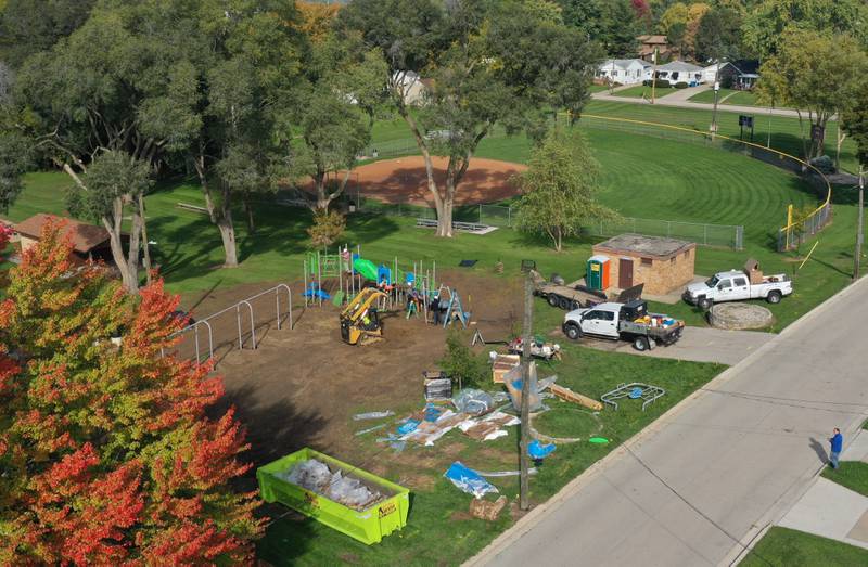 An aerial view of workers installing playground equipment at Sunset Park on Tuesday, Oct. 17, 2023 in Peru. Installation began this week on about $150,000 of upgraded playground equipment located on the south east part of Sunset Park near the intersection of 2nd and Henry Streets. The city received a grant of $43,000 for the new playground. Crews are hoping to have it completed by next week.