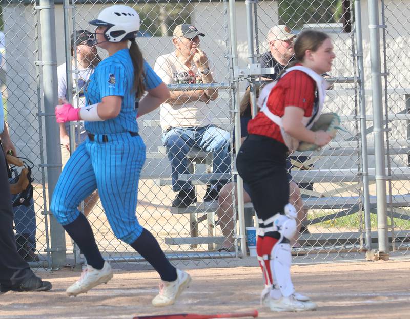 Marquette's Lily Brewer scores a run against Henry-Senachwine on Thursday, April 23, 2026 at June Cross Field in Ottawa.
