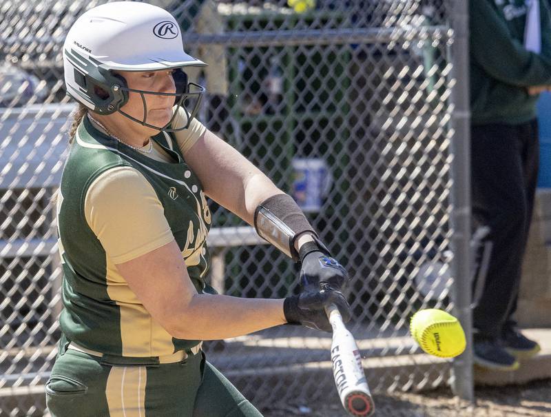 St. Bede's Bella Pinter makes contact with the ball in a game against Putnam County on April 4, 2023 at St. Bede Academy.