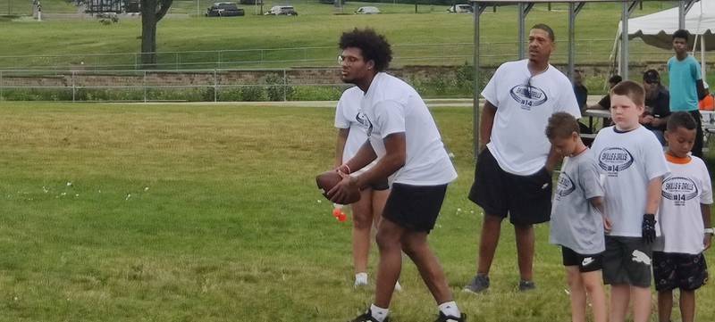 NIU defensive back and DeKalb graduate Jordan Gandy works on drills with campers  on Sunday, July 24, 2022 at the Youth Pride Foundation Skills and Drills Football camp.