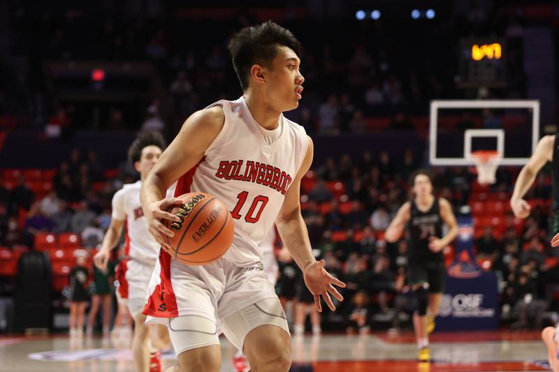 Bolingbrook’s MJ Langit looks to make a play against Glenbard West in the Class 4A semifinal at State Farm Center in Champaign. Friday, Mar. 11, 2022, in Champaign.