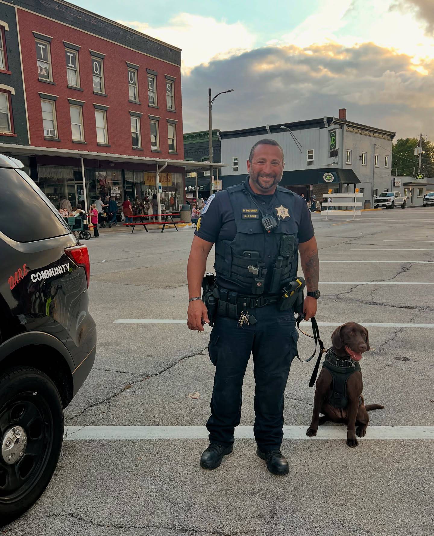 Sandwich Police Sgt. William Meisner and Sandwich police dog Musil greet people attending the Taste of Sandwich on Sept. 24, 2025.
