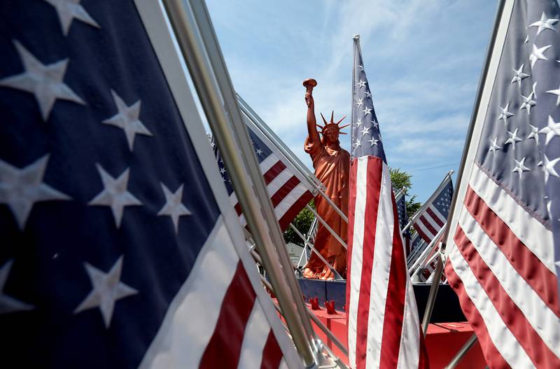 American flags and the Statue of Liberty on a float for Sades Farm and Market during the opening day of the McHenry County Fair on Tuesday, July 29, 2025. The fair runs through Sunday at the fairgrounds in Woodstock.