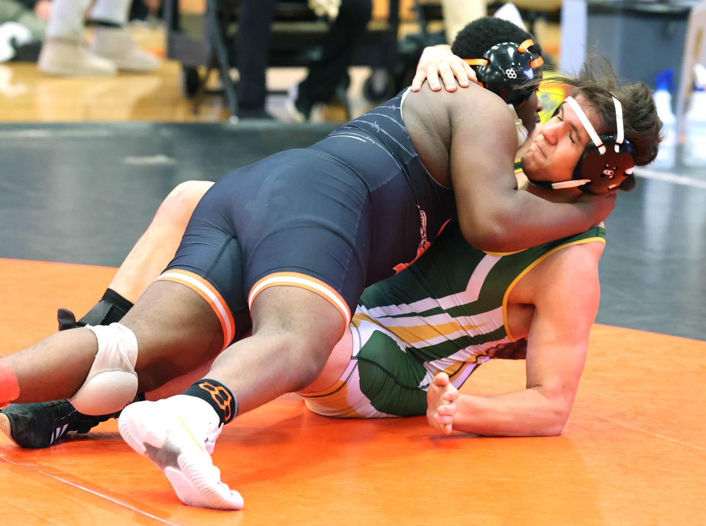 DeKalb’s Lamar Bradley gets Waubonsie Valley’s Jacob Walker to his back in their 220 pound semifinal match Friday, Jan. 20, 2023, during the DuPage Valley Conference wrestling tournament at DeKalb High School.