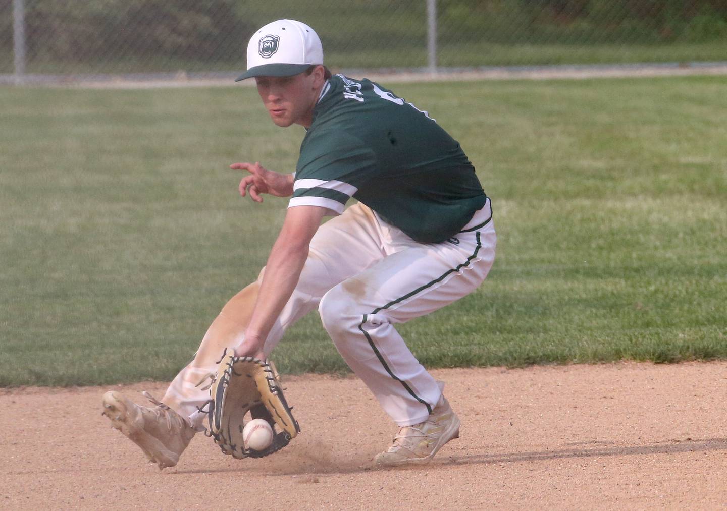 St. Bede's Brendan Pillion back hands the ball at short stop to make a play against Yorkvlle Christian in the Class 1A Regional semifinal game on Thursday, May 18, 2023 at Masinelli Field in Ottawa.
