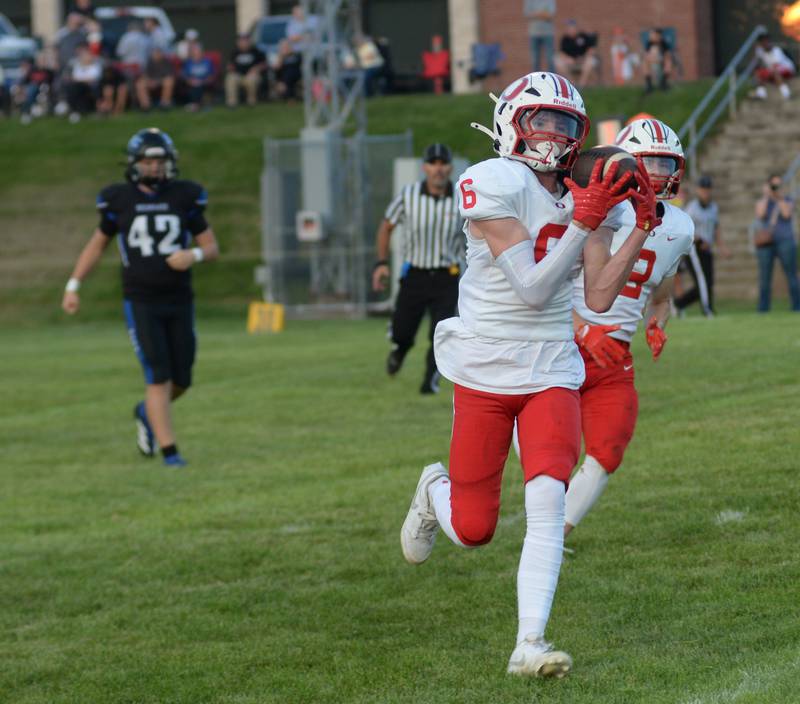 Oregon's Landon Ziller (6) catches a pass for a gain during a practice game with Eastland-Pearl City on Friday, Aug. 22, 2025 at Lanark. The Hawks open the 2025 season at Genoa-Kingston on Friday, Aug. 29 while EPC hosts Fulton.