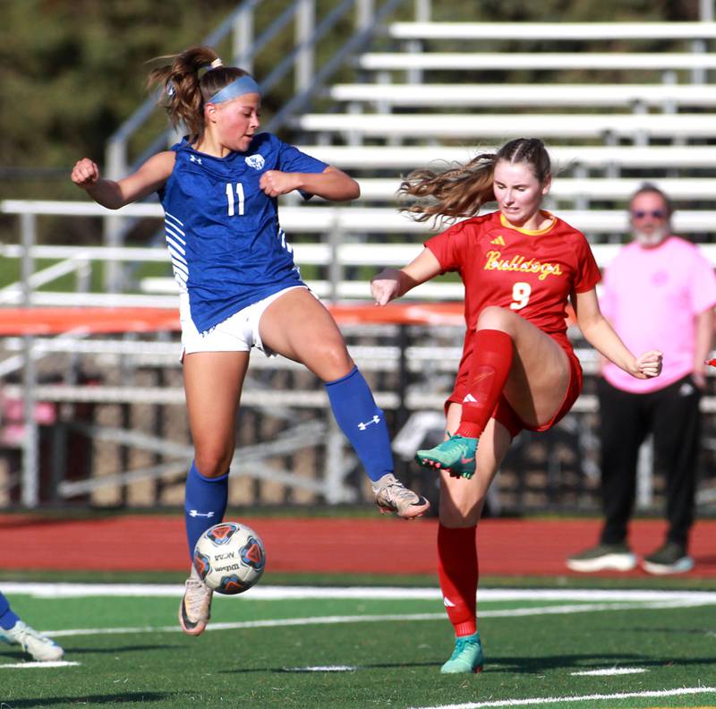 Geneva's Elle Larsen and Batavia's Alexa Schorr go for the ball during a Tri-Cities Soccer Night game on Tuesday, April 29, 2025 at St. Charles East.