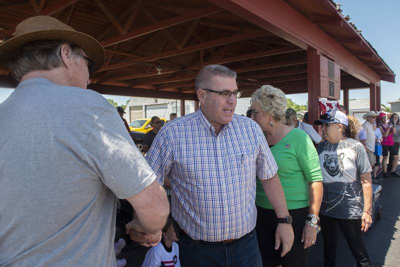 Gubernatorial candidate Darren Bailey greets the crowd in Amboy Friday, June 17, 2022 as he makes a campaign trip across northern Illinois. Bailey is on the republican ticket for this month’s primary.