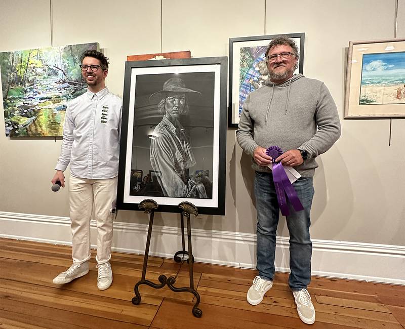 Matt Jagitsch (right) was awarded the Myrtle Walgreen Best of Show Award for the 75th Phidian Art Awards Competition by judge Tim Harrison. The show held an opening on Friday, April 5, 2024, at The Next Picture Show.