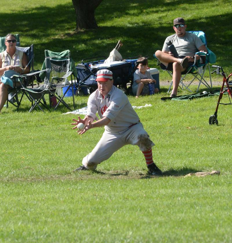 Ganymede first baseman Scott Tilton catches a ball for an out during Sunday, Aug. 12, 2023 action at the 20th Annual World Tournament of Historic Base Ball.
