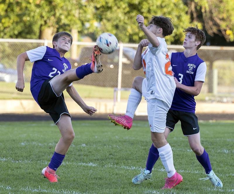Dixon’s Cameron Foulker makes contact with the ball against Winnebago Thursday, Sept. 26, 2024, at Dixon High School.