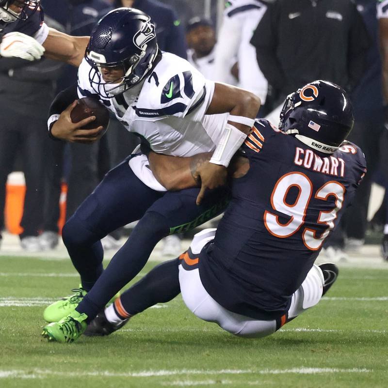 Chicago Bears defensive tackle Byron Cowart sacks Seattle Seahawks quarterback Geno Smith during their game Sunday, Dec. 26, 2024, at Soldier Field in Chicago.