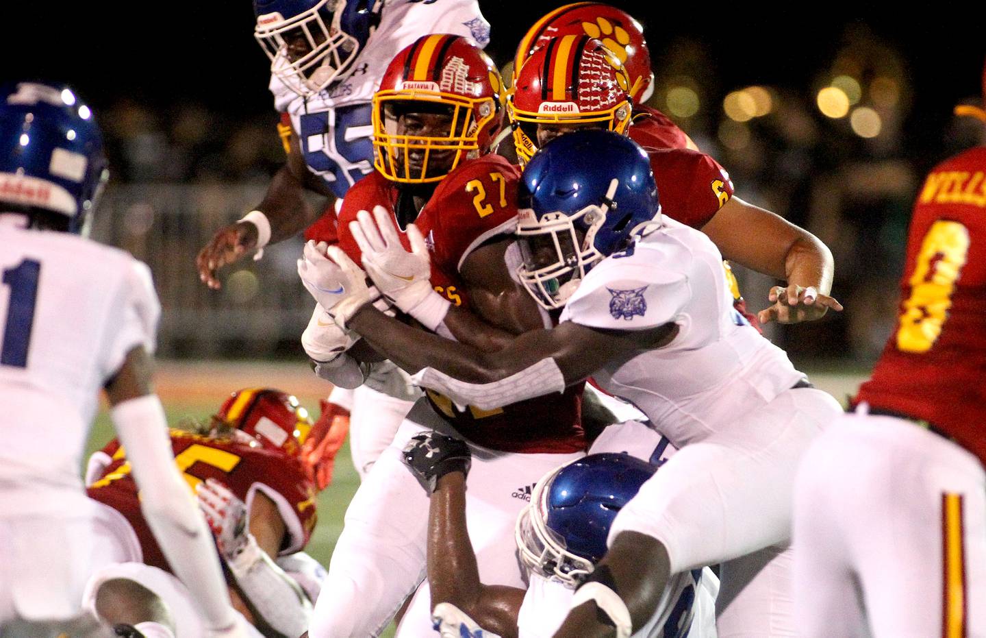 Batavia's Jalen Buckley (27) runs the ball during the first game of the season against Phillips in Batavia on Friday, Aug. 27, 2021.