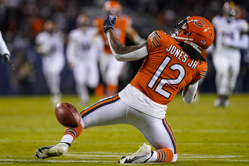 Chicago Bears wide receiver Velus Jones Jr. fumbles a punt during the second half, Thursday, Oct. 13, 2022, against the Washington Commanders in Chicago.