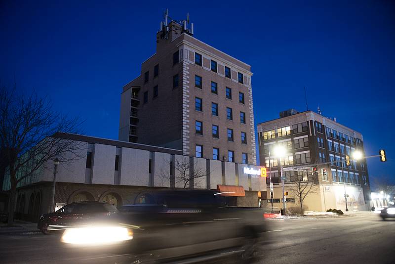 A local developer is converting the top five floors of the Midland States Bank building in Sterling into luxury condos.