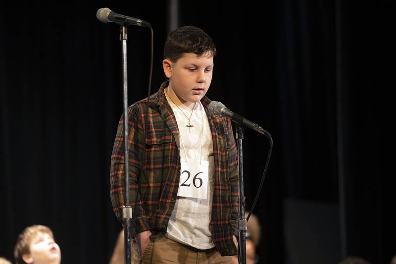 Madison School fifth grader Brycen Simonton appears on stage Thursday, March 9, 2023 during the Lee-Ogle-Whiteside Regional Spelling Bee.