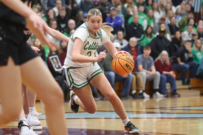 Providence’s Eilish Raines makes a move to the paint against Washington in the Class 3A Kankakee Super-Sectional game on Monday, March 3, 2026 in Kankakee.