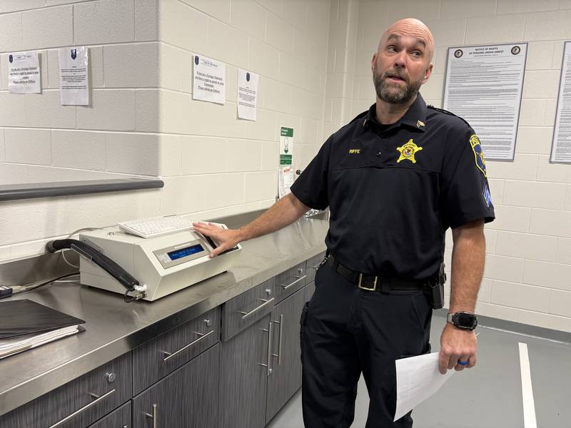 Sgt. Chad Riffe shows the breath machine at the Lake in the Hills Police Department jail Wednesday, May, 20, 2026.