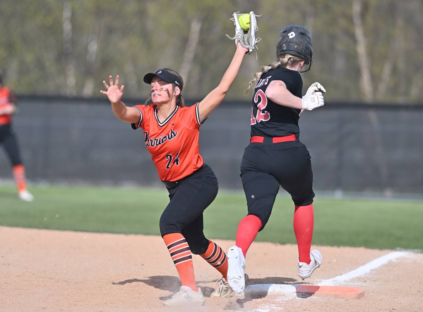 Lincoln-Way Central's player catches the ball at first base during the conference game against Lincoln-Way West on Thursday, April. 27, 2023, at New Lenox.