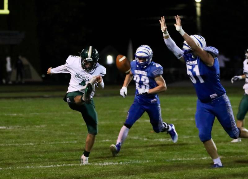 Princeton's Augie Christiansen shrugs off St. Bede's Ryan Brady Friday Night at Bryant Field. The Tigers won 56-7.