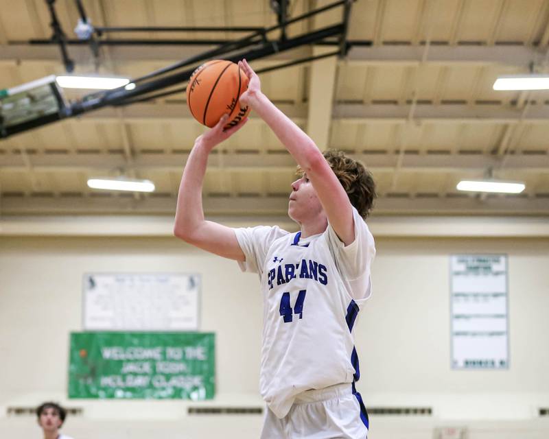 St Francis Ben Whorlow (44) outs up a shot during their Jack Tosh Holiday Classic basketball tournament game between St Francis at Yorkville Thursday Dec 26, 2024 in Elmhurst.