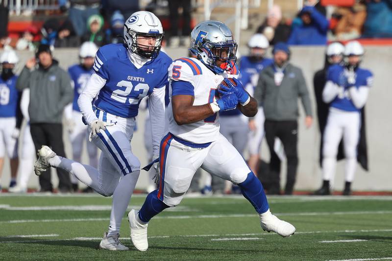 East St. Louis’ Larevious Woods finds daylight on a touchdown run against Geneva in the Class 6A state championship on Saturday, Nov. 30, 2024 in Normal.