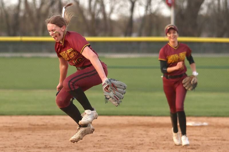Richmond-Burton pitcher Hailey Holtz leaps for joy after the final out of an extra-inning win in varsity softball at Marengo Wednesday evening.