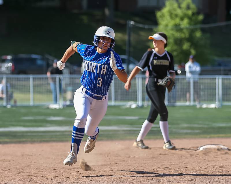 St Charles North's Leigh VandeHei (3) rounds second base during the Class 4A Glenbard West Regional Final softball game between Glenbard North at St Charles North.  May 26, 2023.