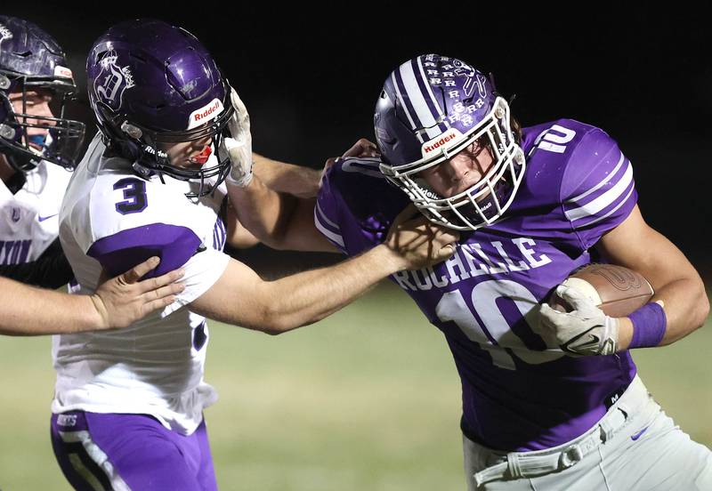 Rochelle's Garrett Gensler is forced out of bounds by Dixon’s Ryan Ramsdell during their first round playoff game Friday, Oct. 28, 2022, at Rochelle High School.