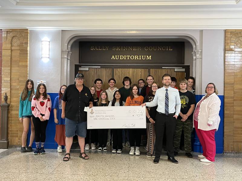 The Princeton Masonic Lodge donated $907 to the Princeton High School Scholastic Bowl team. The Lodge donated to help pay for the team's uniforms.
