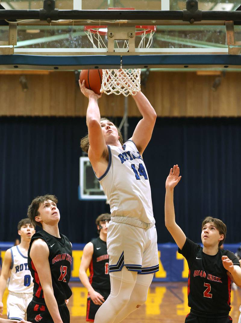 Hinckley-Big Rock's Martin Ledbetter gets to the basket ahead off the Indian Creek defense during their game Tuesday, Jan. 31, 2023, in the Little 10 Conference Basketball Tournament at Somonauk High School.