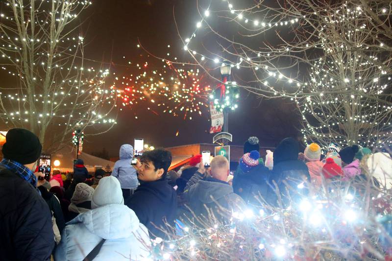 People watch fireworks during A Very Merry Christmas Huntley on Saturday, Dec. 6, 2025. The event this year included a parade for the first time.