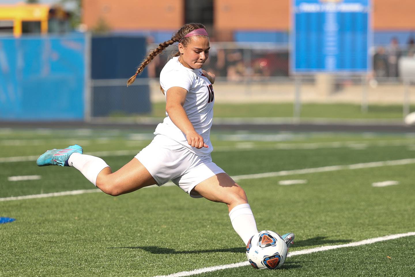 Lincoln-Way Central’s Grace Grundhofer puts the ball in play against Glenbard West in the Class 3A Sandburg Super-sectional. Tuesday, May 220, 2022 in Orland Park.